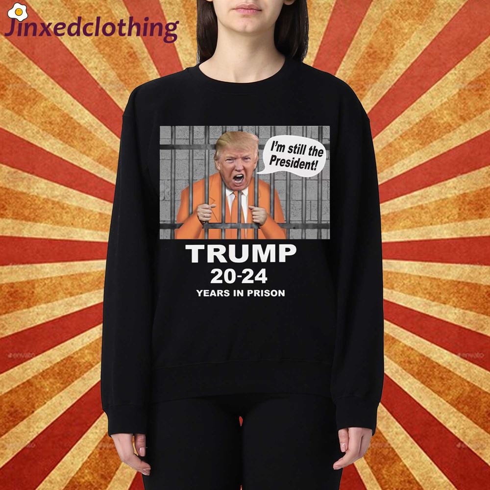 Donald Trump In Prison Jail Cell Behind Bars Unisex T-shirt 